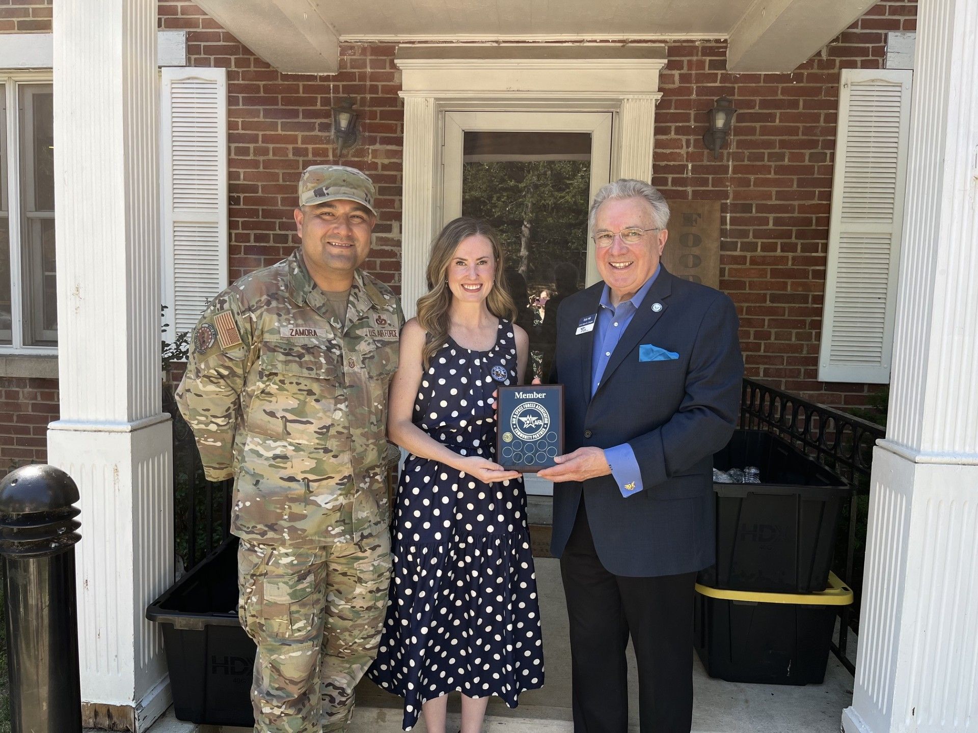 Master Sgt. Ignacio Zamora, JBAB Top 3 Council; Megan Rowley, Steele Chapter vice president military family matters; and Bob Hill, Steele Chapter secretary recognizing the pantry’s Community Partner plaque.